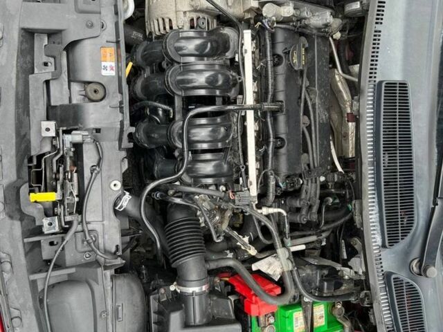 Червоний Форд Фієста, об'ємом двигуна 1.6 л та пробігом 217 тис. км за 8700 $, фото 12 на Automoto.ua