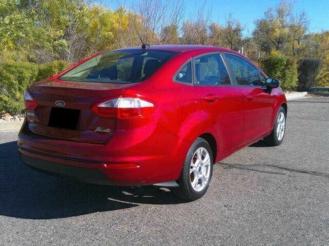 Червоний Форд Фієста, об'ємом двигуна 1.6 л та пробігом 113 тис. км за 2500 $, фото 5 на Automoto.ua