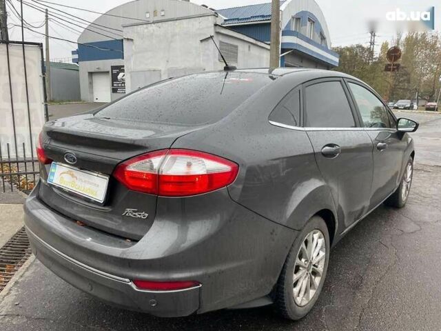 Форд Фиеста, объемом двигателя 1.6 л и пробегом 143 тыс. км за 9399 $, фото 4 на Automoto.ua