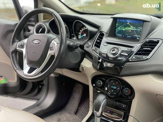 Форд Фиеста, объемом двигателя 1.6 л и пробегом 143 тыс. км за 9399 $, фото 20 на Automoto.ua
