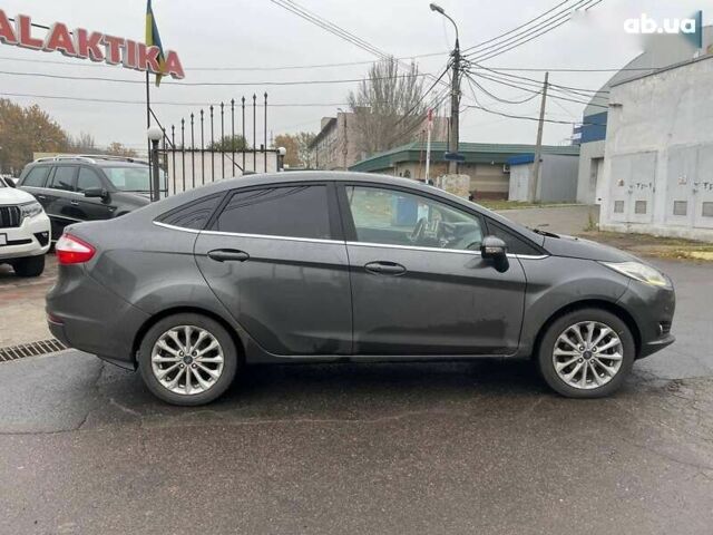 Форд Фиеста, объемом двигателя 1.6 л и пробегом 143 тыс. км за 9399 $, фото 8 на Automoto.ua