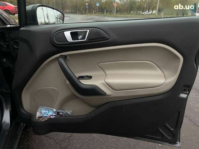 Форд Фиеста, объемом двигателя 1.6 л и пробегом 143 тыс. км за 9399 $, фото 17 на Automoto.ua