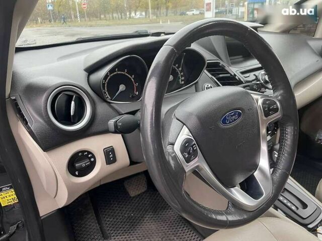 Форд Фиеста, объемом двигателя 1.6 л и пробегом 143 тыс. км за 9399 $, фото 18 на Automoto.ua