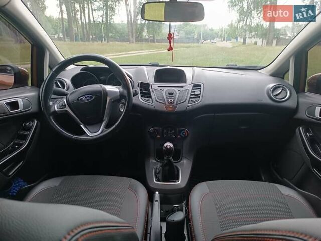 Желтый Форд Фиеста, объемом двигателя 1 л и пробегом 119 тыс. км за 5800 $, фото 10 на Automoto.ua
