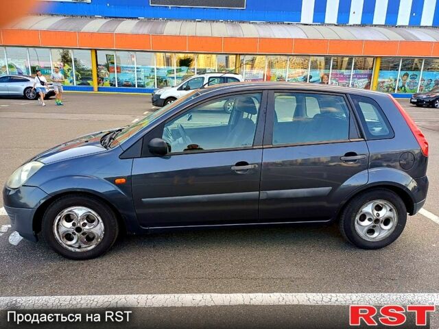 Серый Форд Фиеста, объемом двигателя 1.3 л и пробегом 308 тыс. км за 3900 $, фото 2 на Automoto.ua