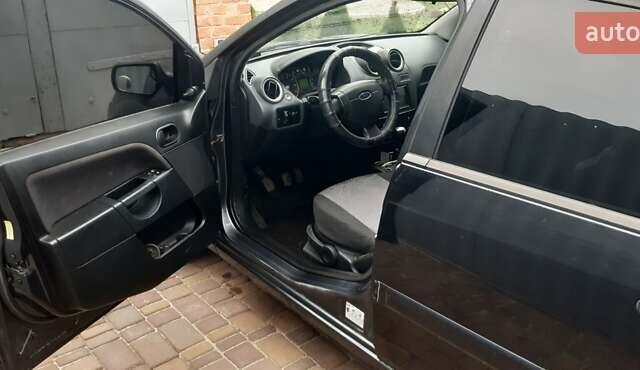 Серый Форд Фиеста, объемом двигателя 1.3 л и пробегом 202 тыс. км за 2800 $, фото 6 на Automoto.ua
