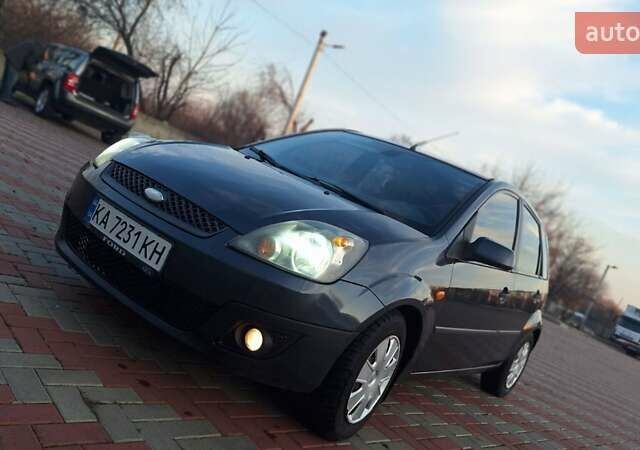 Серый Форд Фиеста, объемом двигателя 1.39 л и пробегом 269 тыс. км за 3800 $, фото 7 на Automoto.ua