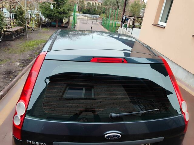Сірий Форд Фієста, об'ємом двигуна 1.4 л та пробігом 204 тис. км за 3550 $, фото 5 на Automoto.ua