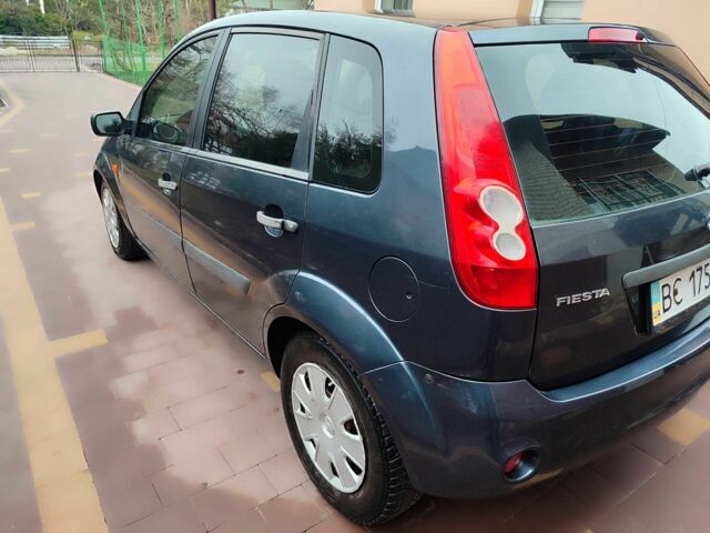 Сірий Форд Фієста, об'ємом двигуна 1.4 л та пробігом 204 тис. км за 3550 $, фото 4 на Automoto.ua