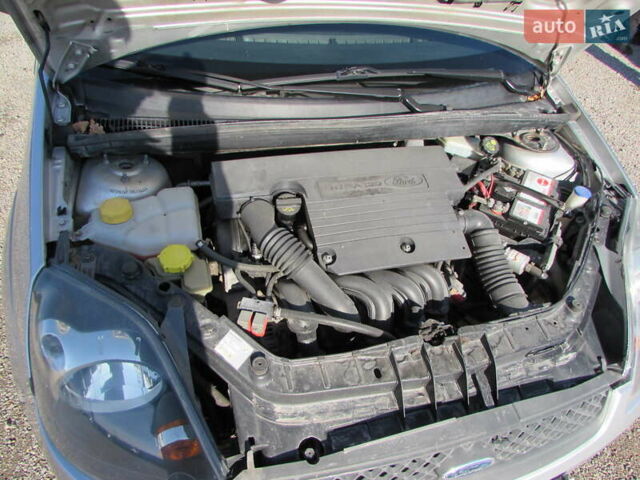 Серый Форд Фиеста, объемом двигателя 1.39 л и пробегом 223 тыс. км за 4200 $, фото 24 на Automoto.ua