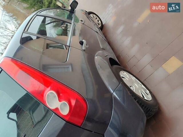 Серый Форд Фиеста, объемом двигателя 1.39 л и пробегом 203 тыс. км за 2999 $, фото 3 на Automoto.ua