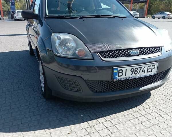 Серый Форд Фиеста, объемом двигателя 1.25 л и пробегом 129 тыс. км за 4900 $, фото 1 на Automoto.ua