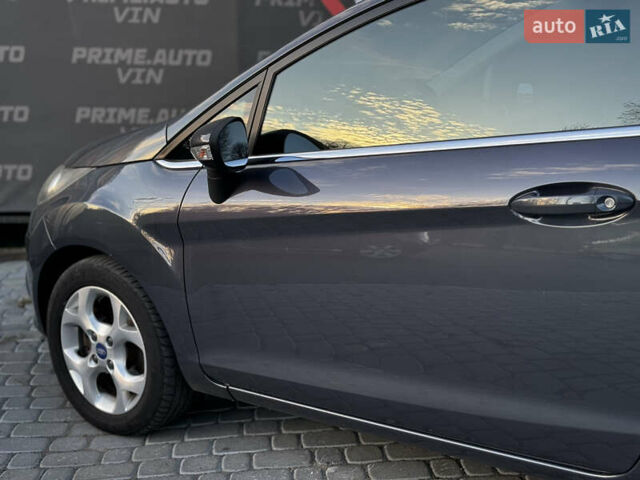 Сірий Форд Фієста, об'ємом двигуна 1.25 л та пробігом 98 тис. км за 5600 $, фото 13 на Automoto.ua