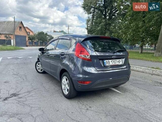 Серый Форд Фиеста, объемом двигателя 1.25 л и пробегом 97 тыс. км за 5499 $, фото 7 на Automoto.ua