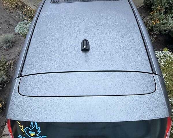 Сірий Форд Фієста, об'ємом двигуна 1.6 л та пробігом 95 тис. км за 8500 $, фото 12 на Automoto.ua