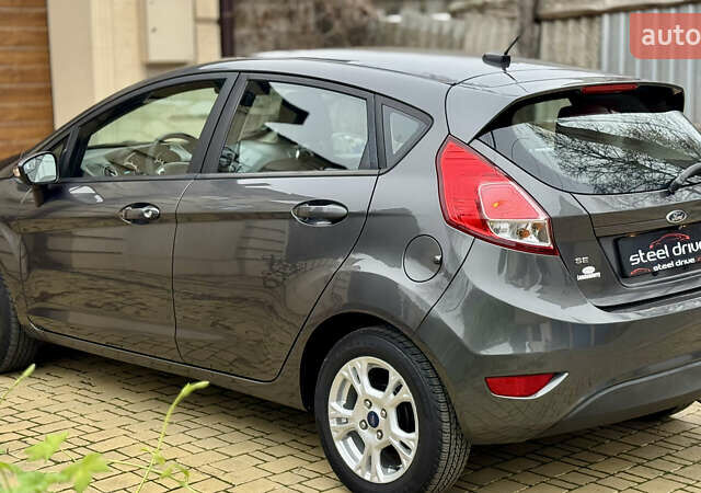 Сірий Форд Фієста, об'ємом двигуна 1.6 л та пробігом 158 тис. км за 8999 $, фото 4 на Automoto.ua
