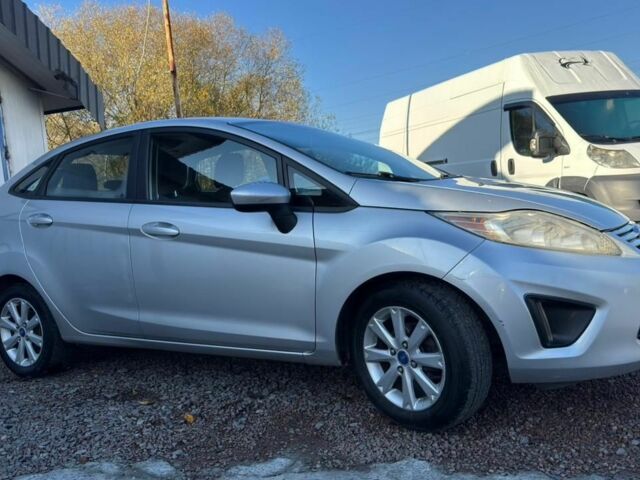 Серый Форд Фиеста, объемом двигателя 1.6 л и пробегом 266 тыс. км за 5700 $, фото 5 на Automoto.ua