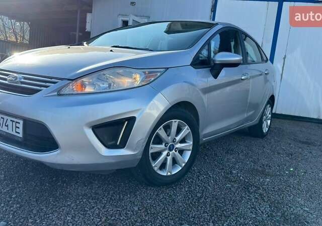 Серый Форд Фиеста, объемом двигателя 1.6 л и пробегом 266 тыс. км за 5700 $, фото 20 на Automoto.ua