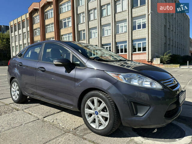 Серый Форд Фиеста, объемом двигателя 1.6 л и пробегом 189 тыс. км за 7000 $, фото 7 на Automoto.ua