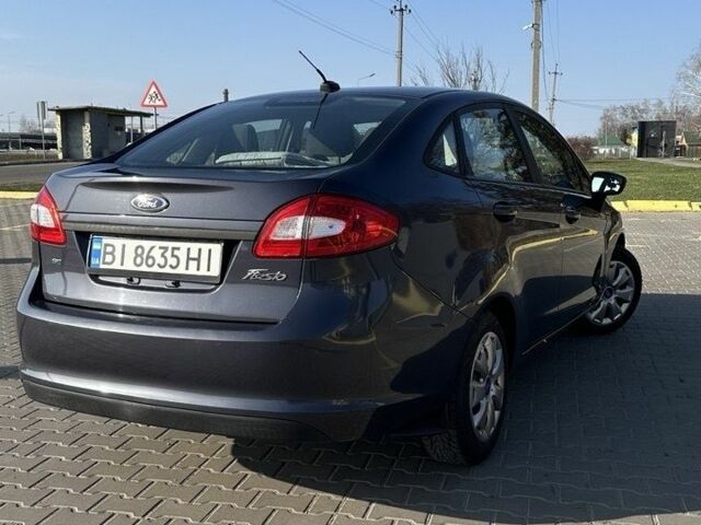 Серый Форд Фиеста, объемом двигателя 1.6 л и пробегом 128 тыс. км за 6800 $, фото 11 на Automoto.ua