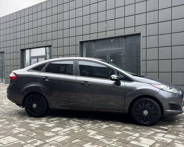 Сірий Форд Фієста, об'ємом двигуна 1 л та пробігом 240 тис. км за 5950 $, фото 14 на Automoto.ua
