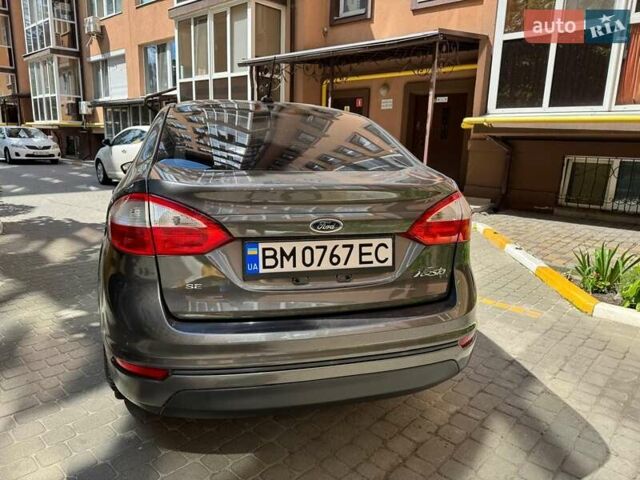 Серый Форд Фиеста, объемом двигателя 1.6 л и пробегом 224 тыс. км за 6800 $, фото 4 на Automoto.ua