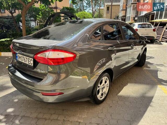 Серый Форд Фиеста, объемом двигателя 1.6 л и пробегом 224 тыс. км за 6800 $, фото 5 на Automoto.ua