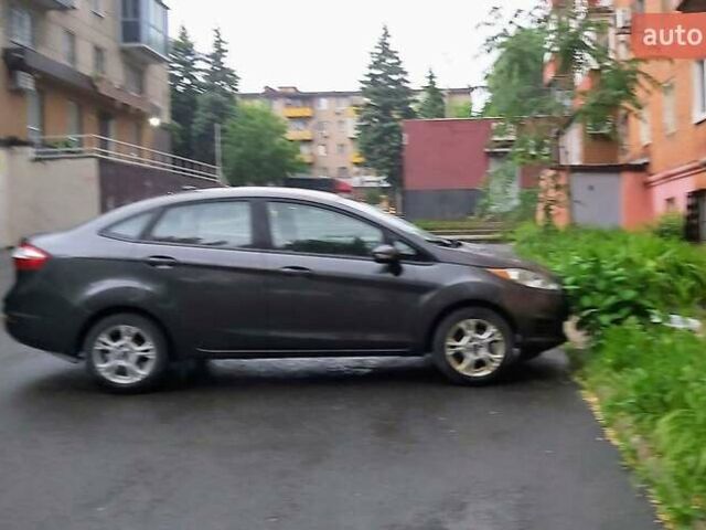 Сірий Форд Фієста, об'ємом двигуна 1.6 л та пробігом 140 тис. км за 8499 $, фото 2 на Automoto.ua