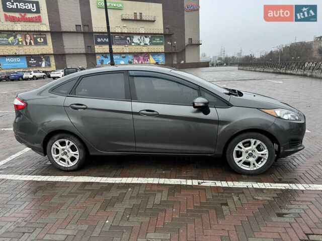 Серый Форд Фиеста, объемом двигателя 1.6 л и пробегом 140 тыс. км за 9500 $, фото 7 на Automoto.ua