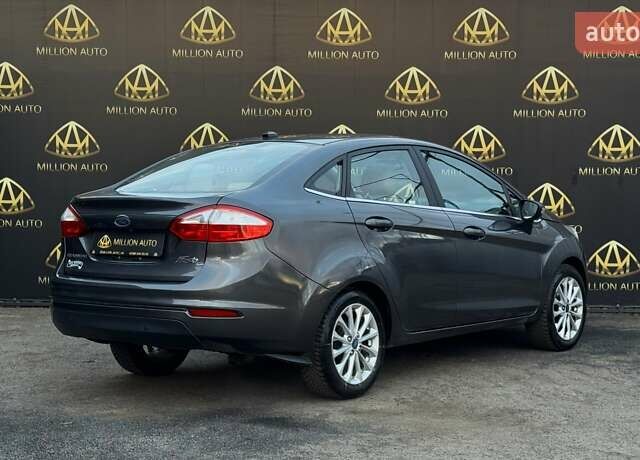 Сірий Форд Фієста, об'ємом двигуна 1.6 л та пробігом 86 тис. км за 7999 $, фото 5 на Automoto.ua