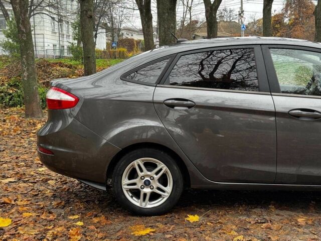 Сірий Форд Фієста, об'ємом двигуна 1.6 л та пробігом 148 тис. км за 6990 $, фото 4 на Automoto.ua