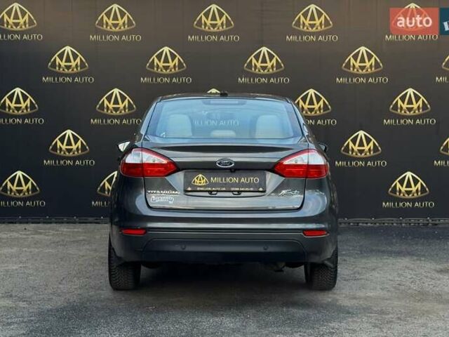 Сірий Форд Фієста, об'ємом двигуна 1.6 л та пробігом 86 тис. км за 7999 $, фото 4 на Automoto.ua