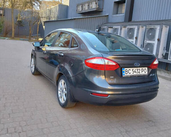 Серый Форд Фиеста, объемом двигателя 1.6 л и пробегом 87 тыс. км за 8800 $, фото 6 на Automoto.ua