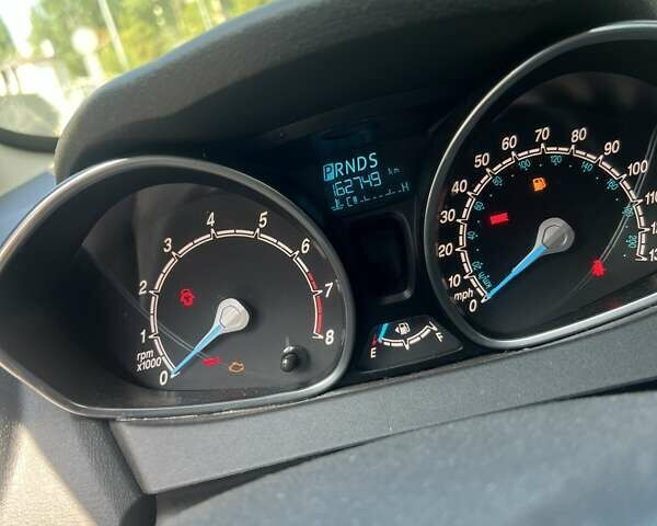 Серый Форд Фиеста, объемом двигателя 1.6 л и пробегом 163 тыс. км за 9000 $, фото 8 на Automoto.ua