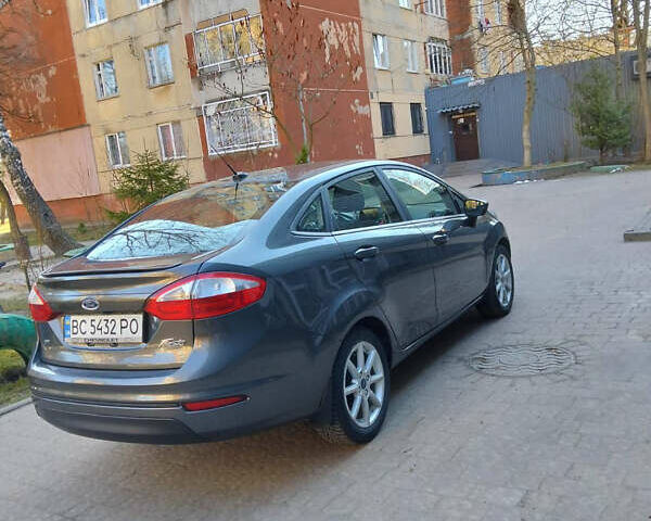 Серый Форд Фиеста, объемом двигателя 1.6 л и пробегом 87 тыс. км за 8800 $, фото 5 на Automoto.ua