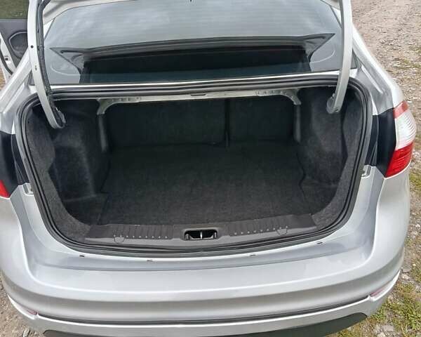 Сірий Форд Фієста, об'ємом двигуна 1.6 л та пробігом 88 тис. км за 8750 $, фото 11 на Automoto.ua