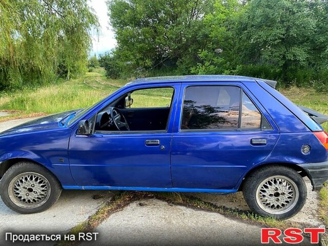 Синий Форд Фиеста, объемом двигателя 1.1 л и пробегом 200 тыс. км за 1200 $, фото 1 на Automoto.ua