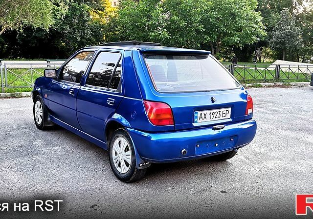 Синий Форд Фиеста, объемом двигателя 1.1 л и пробегом 290 тыс. км за 1350 $, фото 3 на Automoto.ua