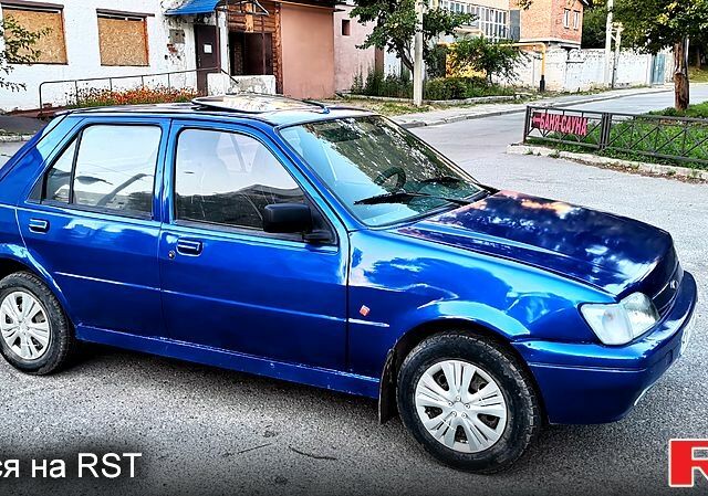 Синий Форд Фиеста, объемом двигателя 1.1 л и пробегом 290 тыс. км за 1350 $, фото 4 на Automoto.ua