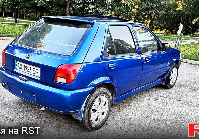 Синий Форд Фиеста, объемом двигателя 1.1 л и пробегом 290 тыс. км за 1350 $, фото 5 на Automoto.ua