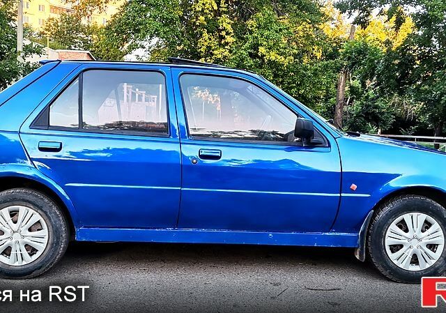 Синий Форд Фиеста, объемом двигателя 1.1 л и пробегом 290 тыс. км за 1350 $, фото 1 на Automoto.ua