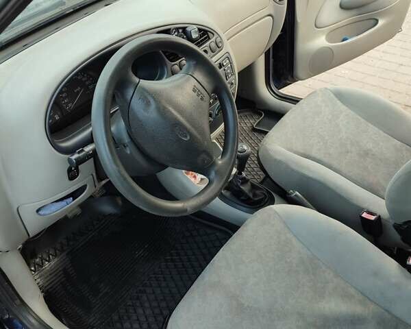 Синий Форд Фиеста, объемом двигателя 1.3 л и пробегом 77 тыс. км за 2500 $, фото 7 на Automoto.ua