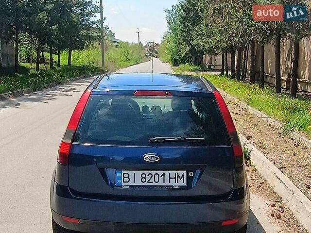 Синий Форд Фиеста, объемом двигателя 1.3 л и пробегом 242 тыс. км за 3300 $, фото 4 на Automoto.ua