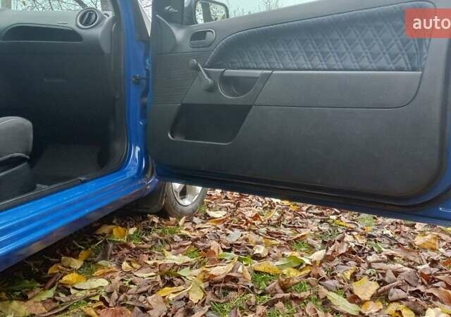 Синий Форд Фиеста, объемом двигателя 1.4 л и пробегом 247 тыс. км за 3950 $, фото 19 на Automoto.ua