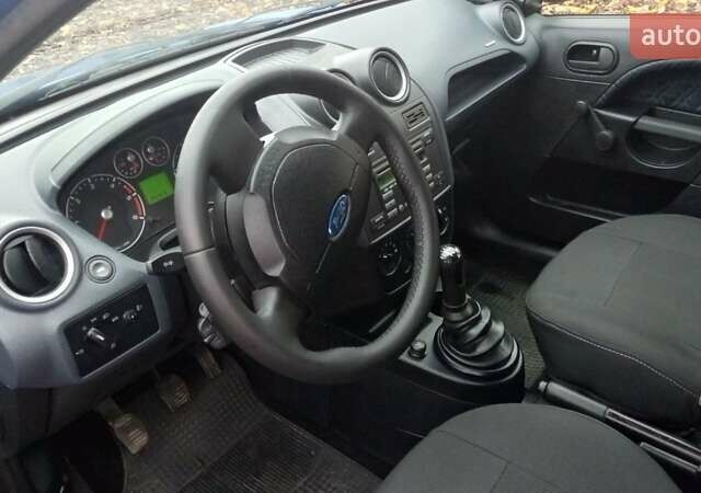 Синий Форд Фиеста, объемом двигателя 1.4 л и пробегом 247 тыс. км за 3950 $, фото 20 на Automoto.ua