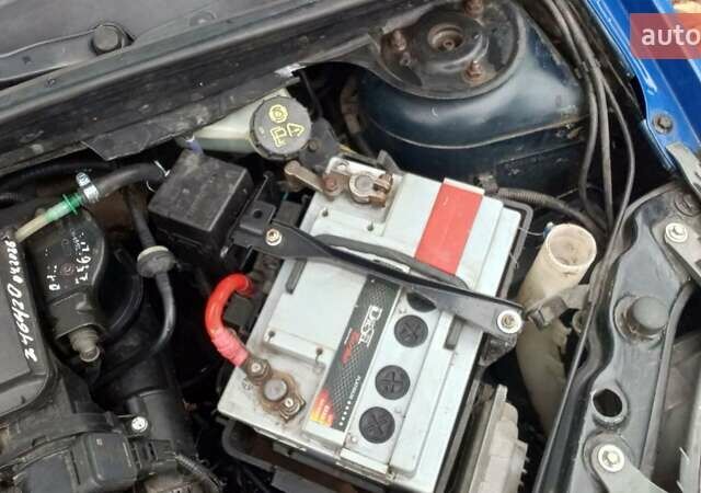 Синий Форд Фиеста, объемом двигателя 1.4 л и пробегом 247 тыс. км за 3950 $, фото 22 на Automoto.ua