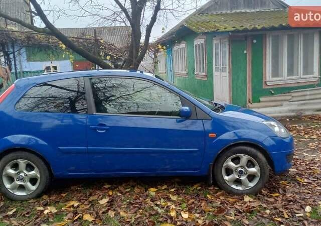 Синий Форд Фиеста, объемом двигателя 1.4 л и пробегом 247 тыс. км за 3950 $, фото 8 на Automoto.ua