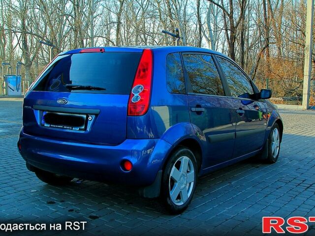 Синий Форд Фиеста, объемом двигателя 14 л и пробегом 191 тыс. км за 3500 $, фото 6 на Automoto.ua