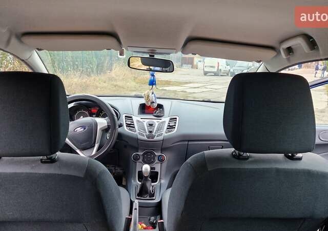 Синий Форд Фиеста, объемом двигателя 1.4 л и пробегом 209 тыс. км за 5500 $, фото 6 на Automoto.ua