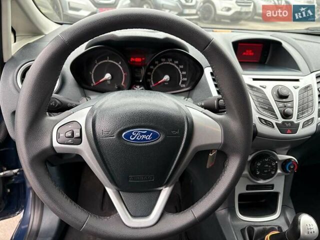 Синий Форд Фиеста, объемом двигателя 1.4 л и пробегом 240 тыс. км за 6190 $, фото 18 на Automoto.ua